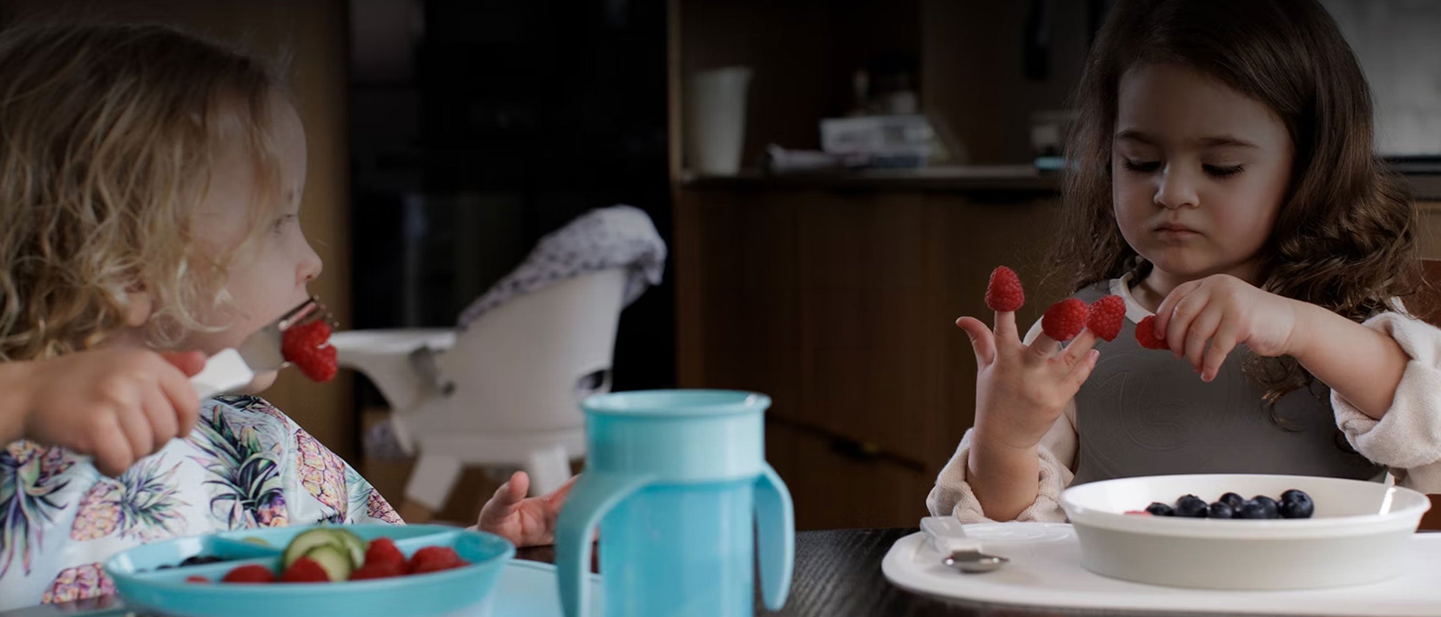 Kids eating fruit with Twistshake kitchenware