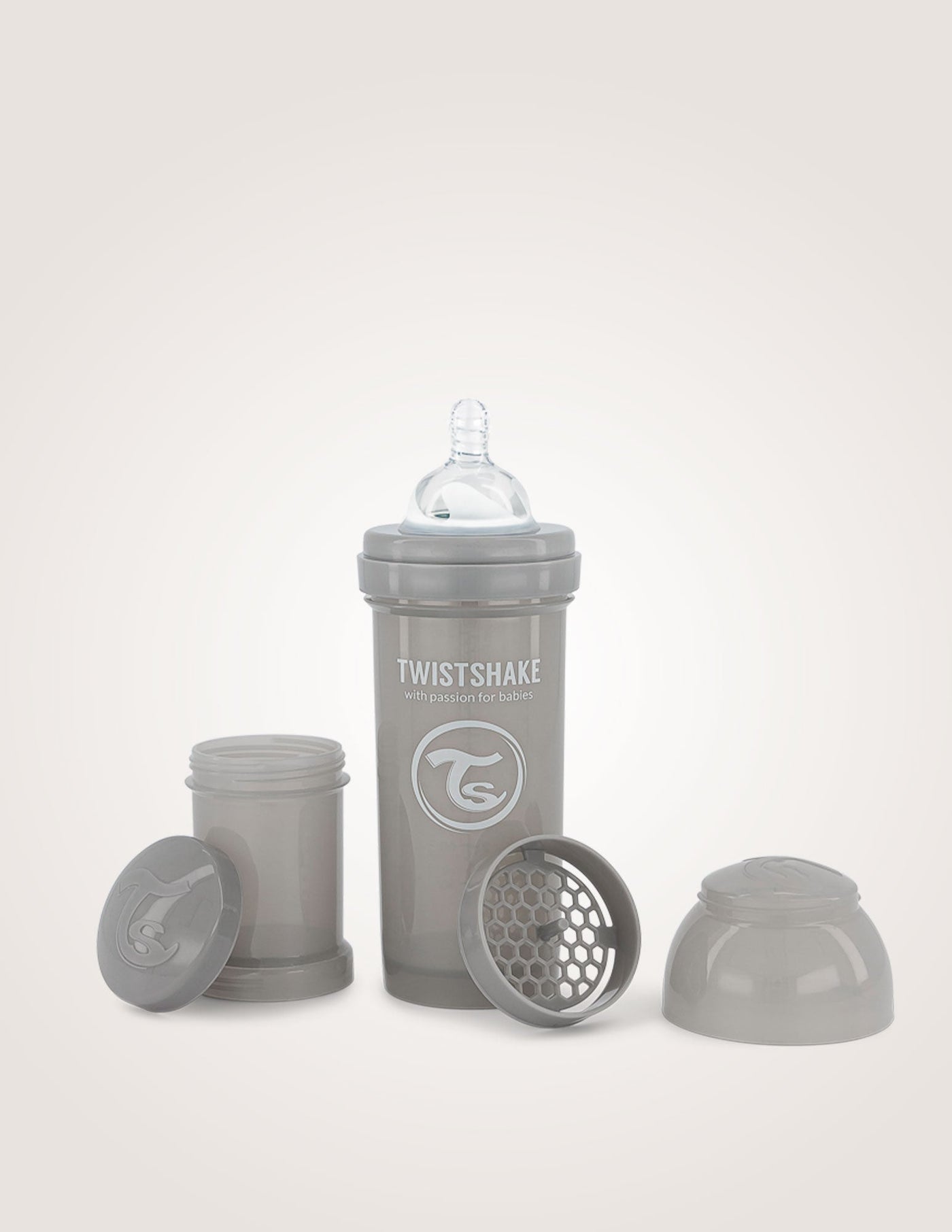 Pastel grey anti-colic baby bottle 260ml Twistshake with integrated mixer, teat, and stackable powder containers.