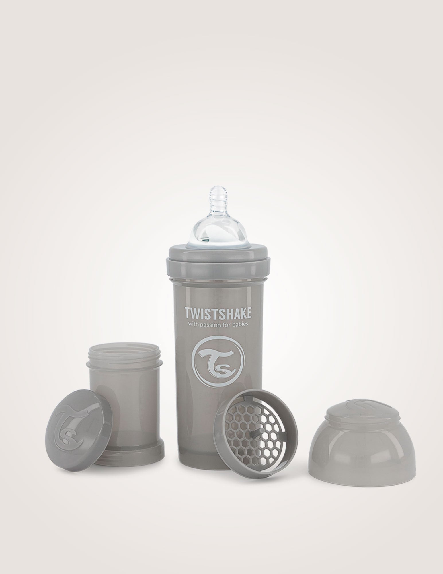 Pastel grey anti-colic baby bottle 260ml Twistshake with integrated mixer, teat, and stackable powder containers.